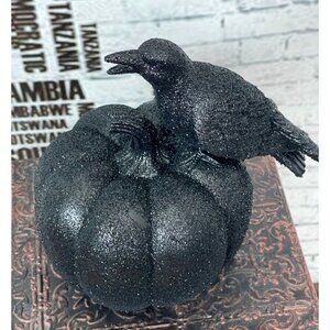 Asia Sourcing Black Glitter Resin Decorative Crow Sitting On Pumpkin Figurine